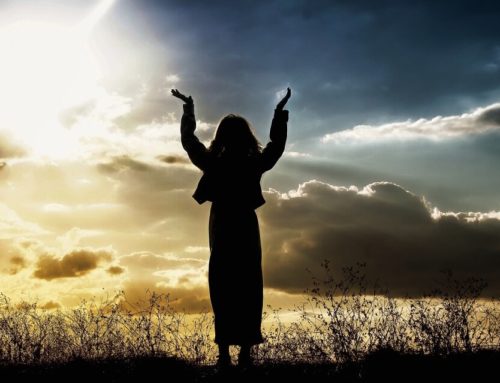 Why do people raise hands for worship?